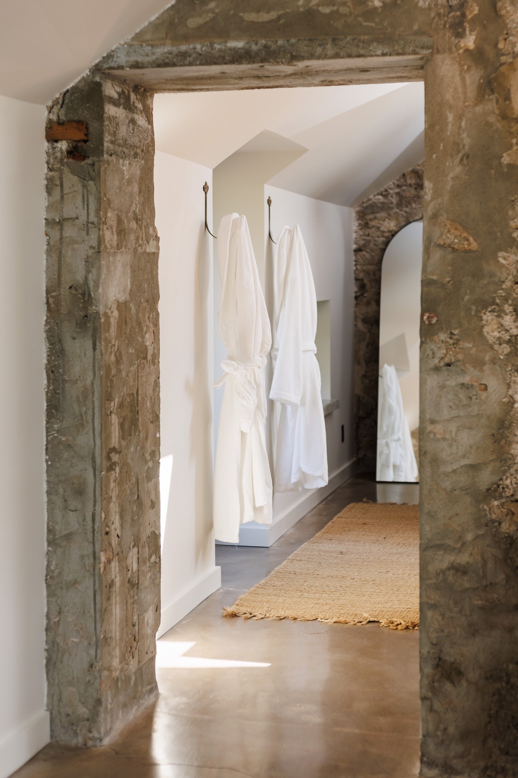 Spa-like bathroom with marble finishes and upscale toiletries