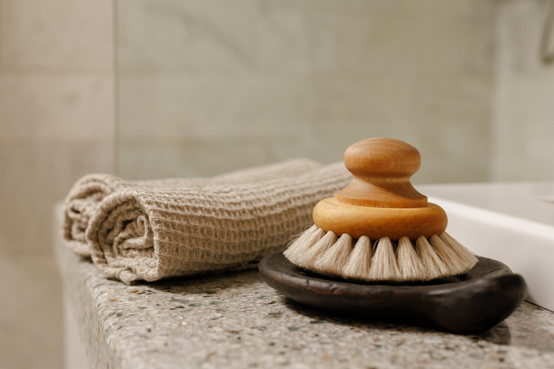 Spa-like bathroom with marble finishes and upscale toiletries