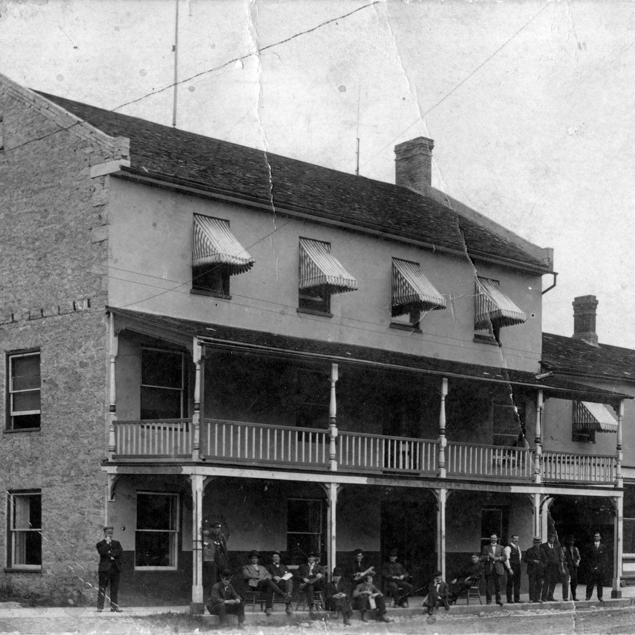 Historic photo of the Kat Florence Hotels property exterior in the 1800s, showcasing classic architectural details and vintage charm